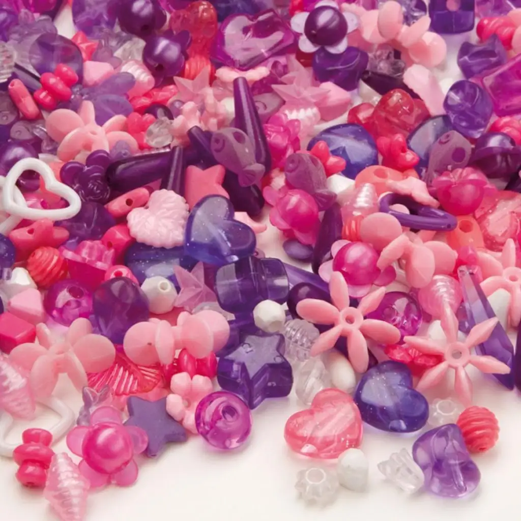 PlayBox: Sada variteľných plastových korálok, 1000 ks, v ružovej a fialovej farbe.