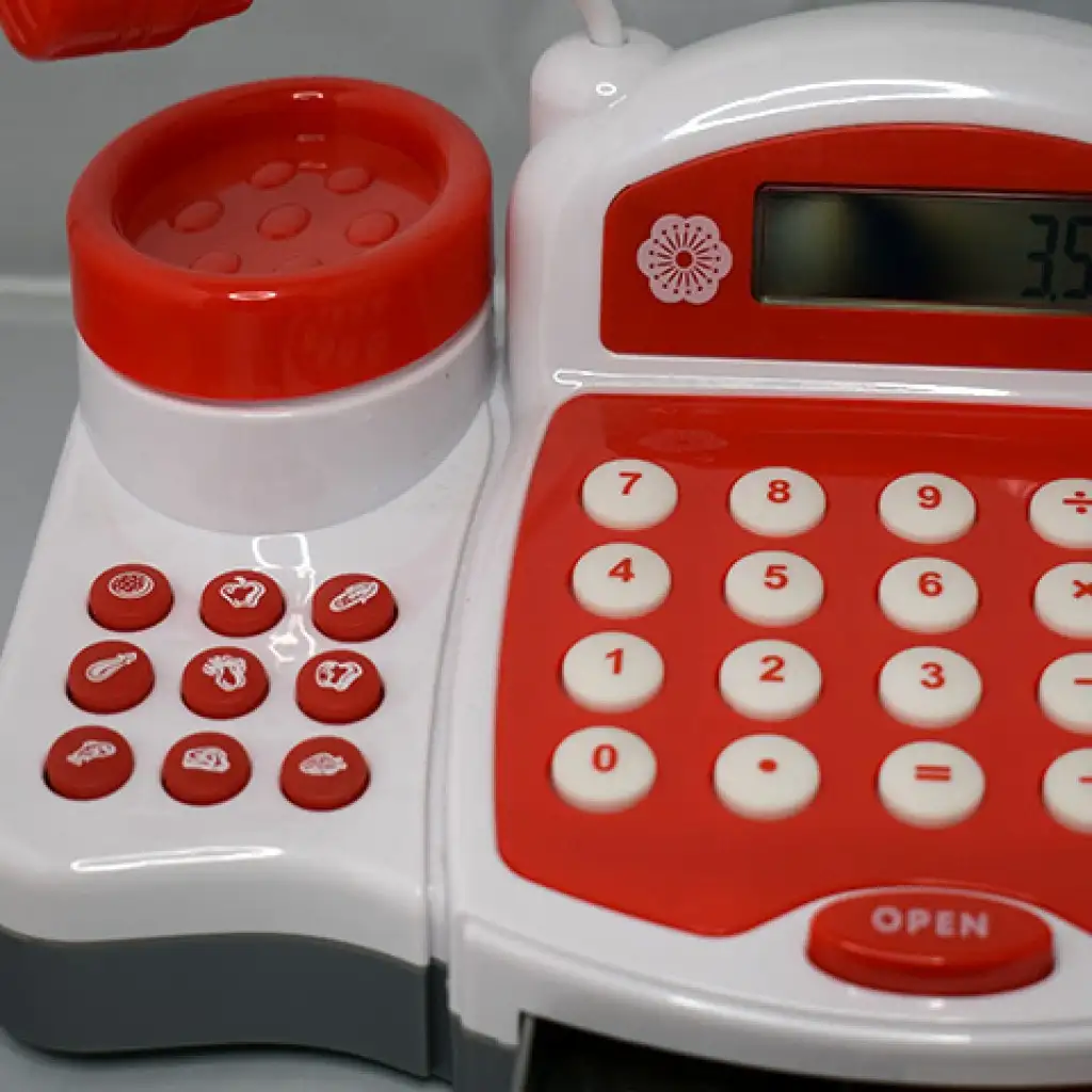 Červená elektrická pokladňa s hracími peniazmi, produktmi a zvukom kép 5